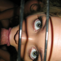 Amateur chick with a hot ass Jessie Andrews does blowjob from a cage