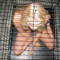 Amateur BDSM scene with a hot babe Jessie Andrews in a cage