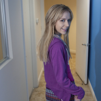Teen babe with long legs Kelly Klass shows her ass upskirt in office