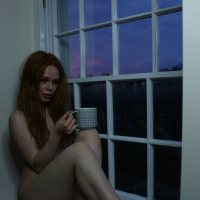 Beautiful chick Ella Hughes posing completely naked by the window