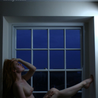 Beautiful chick Ella Hughes posing completely naked by the window