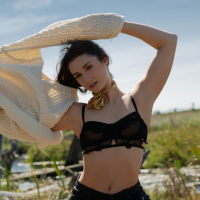 Alexandra Belle showing Her perky little Titties