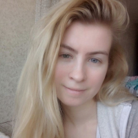 Blue eyed beauty shows off her tiny tits