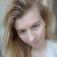 Blue eyed beauty shows off her tiny tits