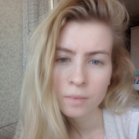 Blue eyed beauty shows off her tiny tits