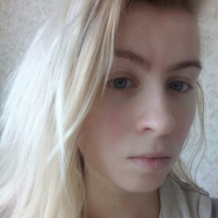 Blue eyed beauty shows off her tiny tits