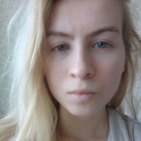 Blue eyed beauty shows off her tiny tits