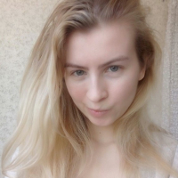 Blue eyed beauty shows off her tiny tits