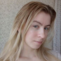 Blue eyed beauty shows off her tiny tits