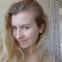 Blue eyed beauty shows off her tiny tits