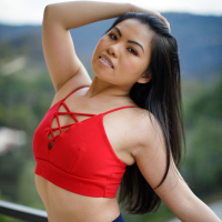 Lovely Cindy Starfall Stips while Posing Outdoors