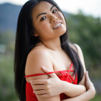 Lovely Cindy Starfall Stips while Posing Outdoors