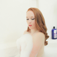 Lucy Ohara has fun in the bath and shows more then just her bubbles
