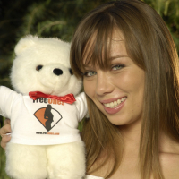 Sexy Alexis Capri poses in some FreeOnes gear