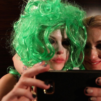 Busty cosplayers Leya Falcon Nadia White are enjoying some strapon action