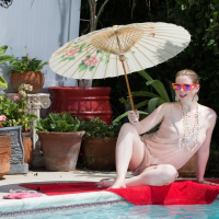 Seductive Chick Sunny Lane poses naked in the Sun
