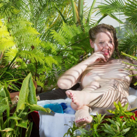 Gorgeous Sunny Lane poses naked outdoors