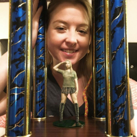 Naughty Girl Sunny Lane posing with her Trophy