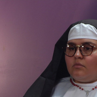Curvy nun Karla Lane spanks a male parishoner