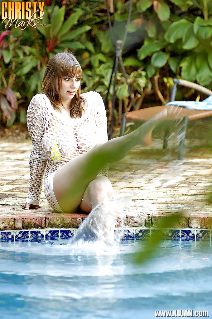Busty bbw girl Christy Marks stripping from fishnets and bikini in the pool - Photo #584830