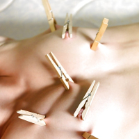 Skinny redhead BDSM model Susana Melo has clothespin attached to tits