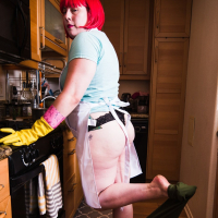 Chubby redhead Lana Del Lust showing off her curvy body