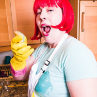 Chubby redhead Lana Del Lust showing off her curvy body