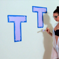Big boobed Tiffany Tyler gets naked and plays with paint