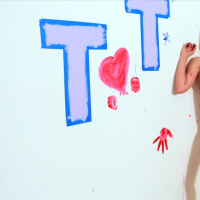 Big boobed Tiffany Tyler gets naked and plays with paint