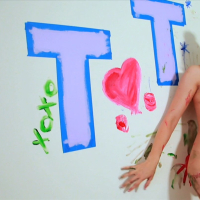 Big boobed Tiffany Tyler gets naked and plays with paint