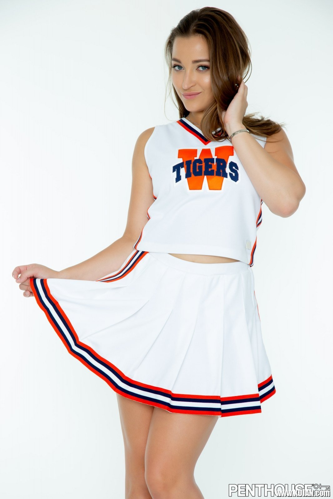Lovely cheerleader Dani Daniels gets naked and poses in black high heels - Photo #609736