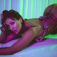 Tattooed girl Mariana Martix teasing with her sexy curves while posing