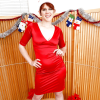 Older redhead Lily Cade tugging on hairy pussy hairs in high heels at Xmas