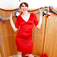 Redhead MILF Lily Cade spreading hairy pussy at Christmas time