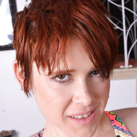 Redhead MILF Lily Cade spreading hairy cooter after bikini removal