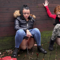 Daphne Klyde and Sandra take a leak together