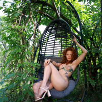 Beautiful chick Irene Rouse posing in sexy lingerie outdoors