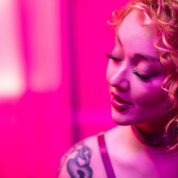 Curly beauty Emma Magnolia strips naked while playing with sextoys