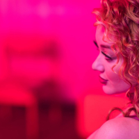 Curly beauty Emma Magnolia strips naked while playing with sextoys