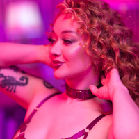 Curly beauty Emma Magnolia strips naked while playing with sextoys