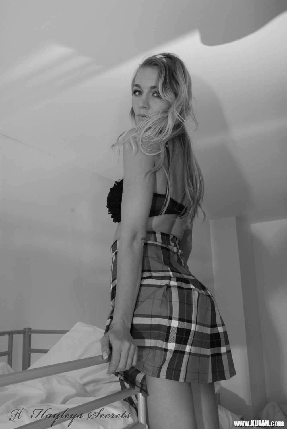 Hayley Marie Coppin takes off her plaid skirt while posing in the bedroom - Photo #687479