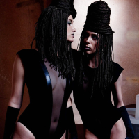 Cosplay lesbian pornstar Aiden Ashley and Kimberly Kane pose in long boots