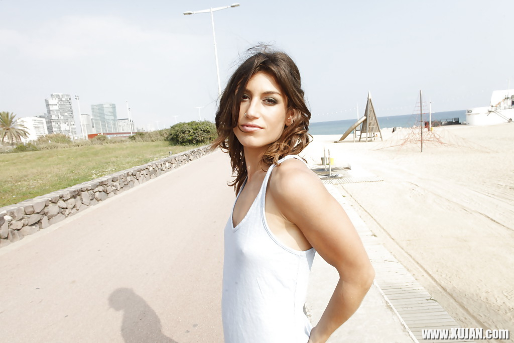 Girl next door Julia Roca shows off her firm ass in public at beach - Photo #696181