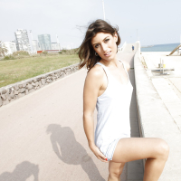 Girl next door Julia Roca shows off her firm ass in public at beach
