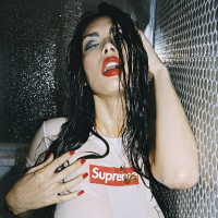 Foxy bitch Tera Patrick posing and getting Wet