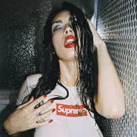 Foxy bitch Tera Patrick posing and getting Wet