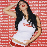 Tera Patrick posing and getting her Tshirt wet
