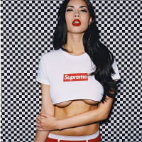 Tera Patrick posing and getting her Tshirt wet