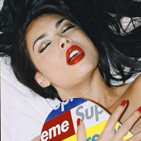 Tera Patrick posing and getting her Tshirt wet