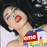 Tera Patrick posing and getting her Tshirt wet